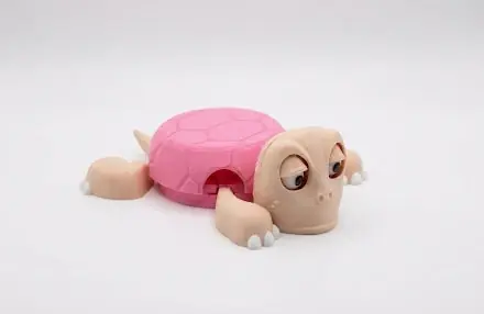 Pembe kabuklu kaplumbağa bardak altlığı, yandan görünüm