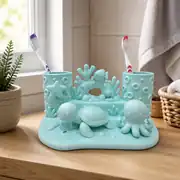 Ahtapot ve kaplumbağa figürlü diş fırçalık, fırçalarla
